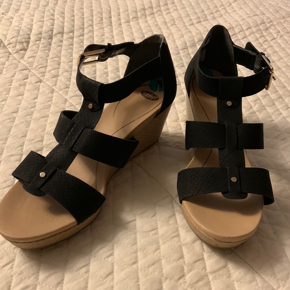 Dr. School’s black strap and cream wedges bottom wedges